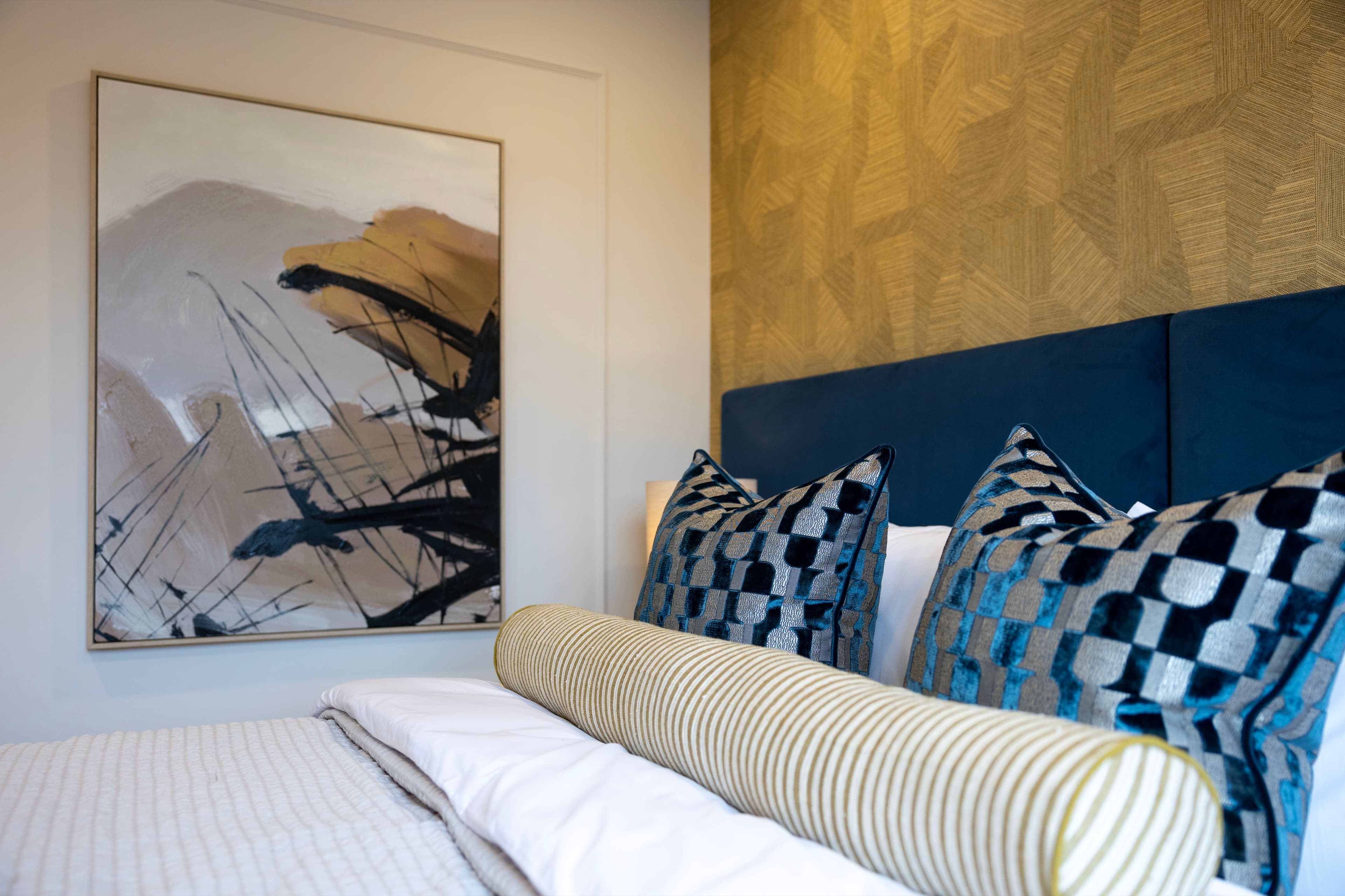 A modern bedroom designed by Focus Agency Group at the Garratt Collection.